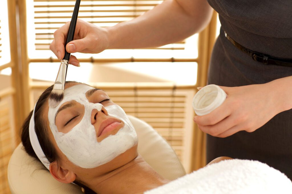 Woman receiving a facial treatment at Radiance by Megan Stockton Facial Spa